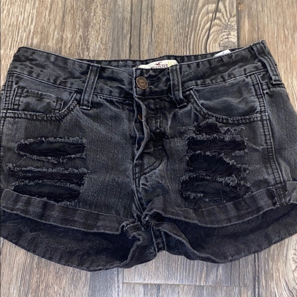 Hollister blacked ripped jean shorts.